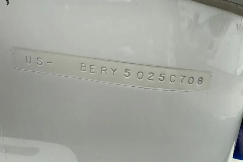  Yacht Photos Pics 2009 Bertram 390 hull identification number, US-BERY5025C708, embossed on white surface.