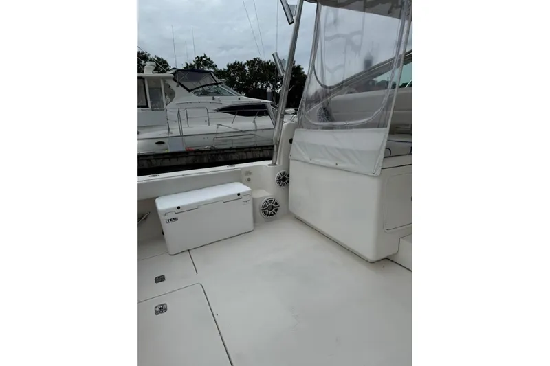  Yacht Photos Pics 2009 Bertram 390 boat deck with Yeti cooler and clear enclosure.