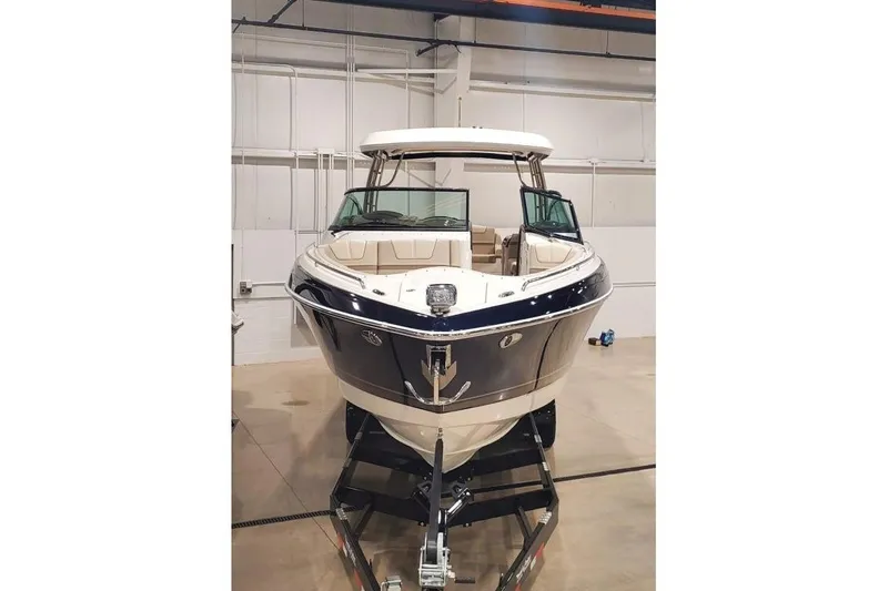  Yacht Photos Pics 2017 Formula 350 Crossover Bowrider in a showroom, front view on trailer.
