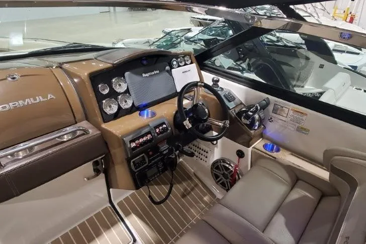  Yacht Photos Pics 2017 Formula 350 Crossover Bowrider cockpit with modern controls and luxurious seating.