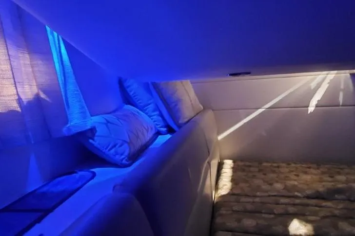  Yacht Photos Pics 2017 Formula 350 Crossover Bowrider interior with blue ambient lighting and cozy seating.