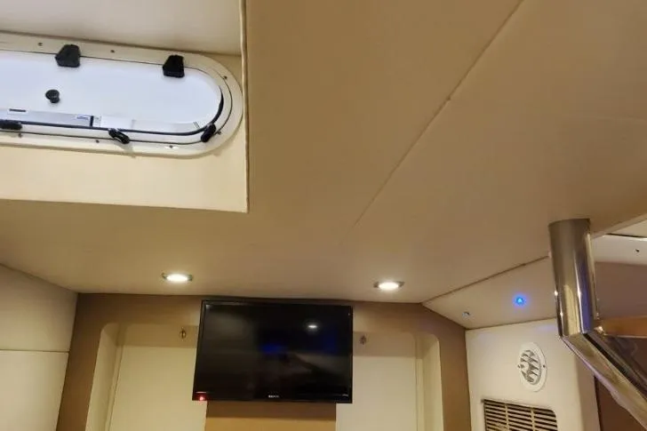  Yacht Photos Pics Interior of a 2017 Formula 350 Crossover Bowrider with TV and ceiling lights.
