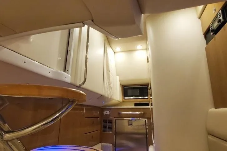  Yacht Photos Pics 2017 Formula 350 Crossover Bowrider interior with modern kitchen amenities and sleek design.