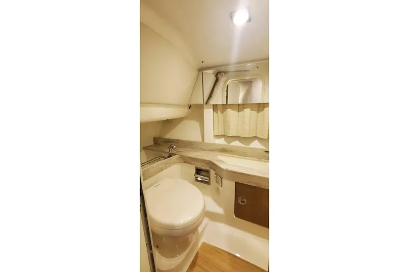  Yacht Photos Pics 2017 Formula 350 Crossover Bowrider bathroom with modern fixtures and compact design.