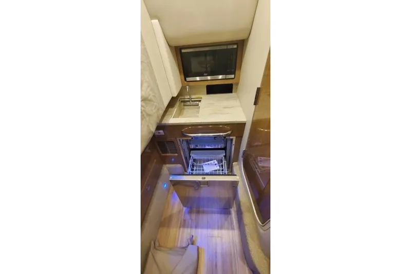  Yacht Photos Pics Interior of 2017 Formula 350 Crossover Bowrider featuring a compact kitchenette.