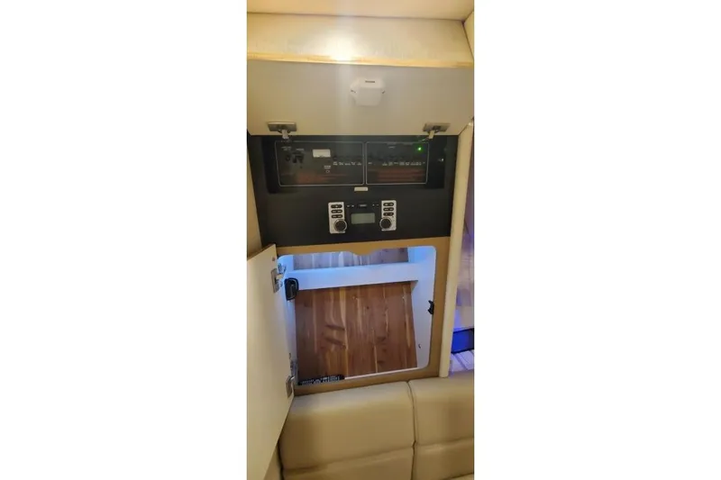  Yacht Photos Pics 2017 Formula 350 Crossover Bowrider interior control panel and storage compartment.