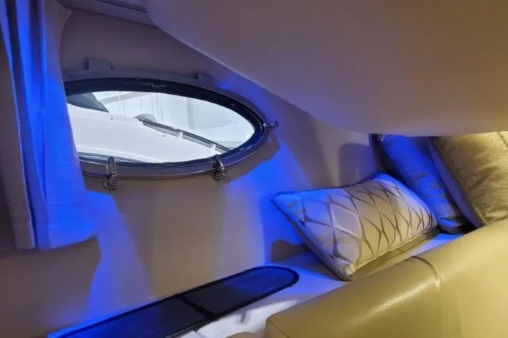  Yacht Photos Pics 2017 Formula 350 Crossover Bowrider cabin interior with blue ambient lighting and porthole.