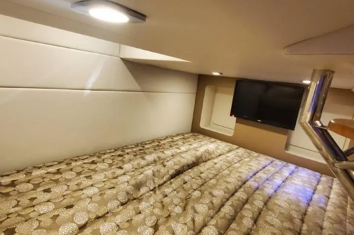  Yacht Photos Pics Interior cabin of 2017 Formula 350 Crossover Bowrider with bed and TV.