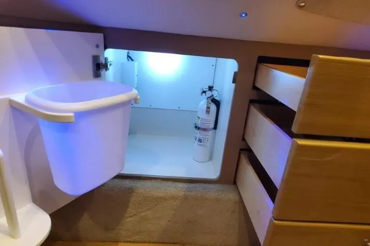  Yacht Photos Pics Interior of 2017 Formula 350 Crossover Bowrider with storage, fire extinguisher, and waste bin.