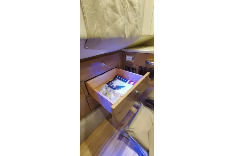  Yacht Photos Pics Open drawer in 2017 Formula 350 Crossover Bowrider, featuring American flag and ambient lighting.