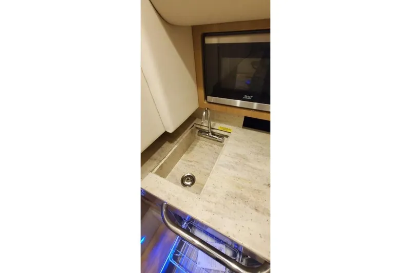  Yacht Photos Pics 2017 Formula 350 Crossover Bowrider interior with sink and microwave.
