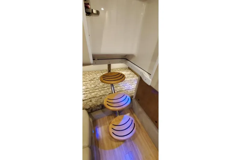  Yacht Photos Pics 2017 Formula 350 Crossover Bowrider interior with wooden steps and modern design.