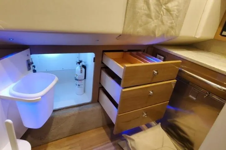  Yacht Photos Pics 2017 Formula 350 Crossover Bowrider interior with drawers, storage, and modern amenities.