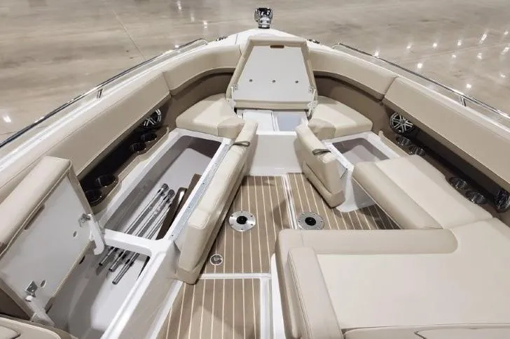  Yacht Photos Pics 2017 Formula 350 Crossover Bowrider interior with beige seating and storage compartments.