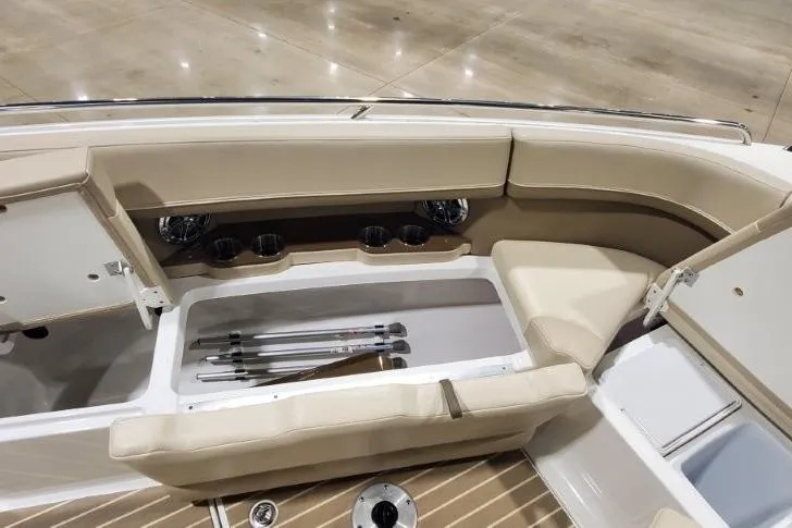 Yacht Photos Pics 2017 Formula 350 Crossover Bowrider interior with beige seating and storage compartments.