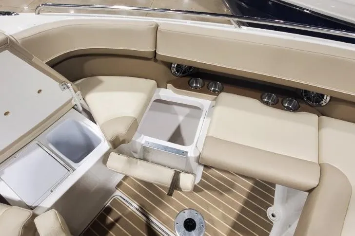  Yacht Photos Pics 2017 Formula 350 Crossover Bowrider interior with beige seating and wood-style flooring.