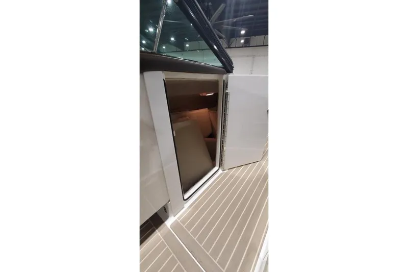  Yacht Photos Pics 2017 Formula 350 Crossover Bowrider cabin entrance with open door, showcasing interior.