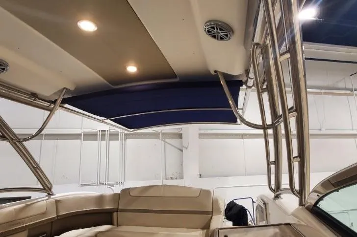  Yacht Photos Pics 2017 Formula 350 Crossover Bowrider interior with beige seating and stainless steel accents.