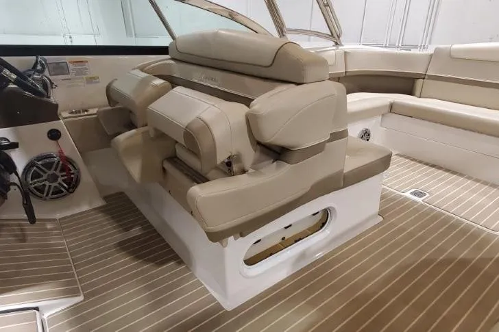  Yacht Photos Pics 2017 Formula 350 Crossover Bowrider interior with beige seating and wood-style flooring.