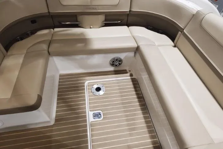  Yacht Photos Pics 2017 Formula 350 Crossover Bowrider interior with beige seating and wood-patterned flooring.