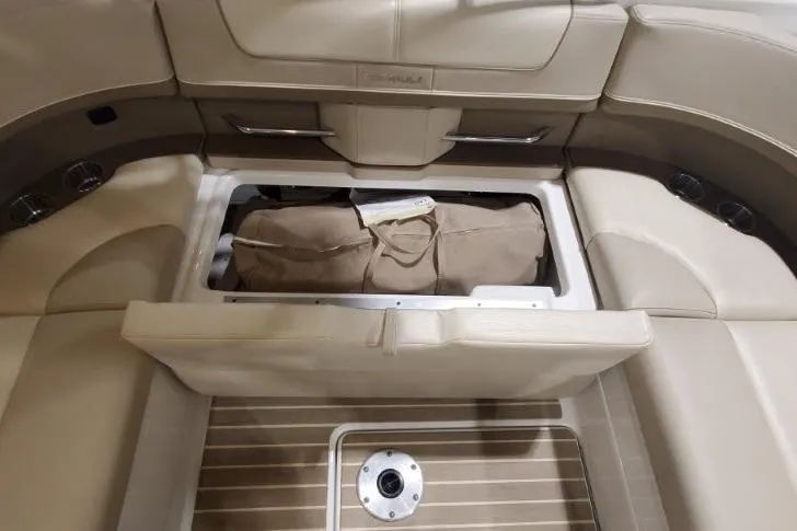  Yacht Photos Pics 2017 Formula 350 Crossover Bowrider interior storage compartment with beige seating and wooden flooring.