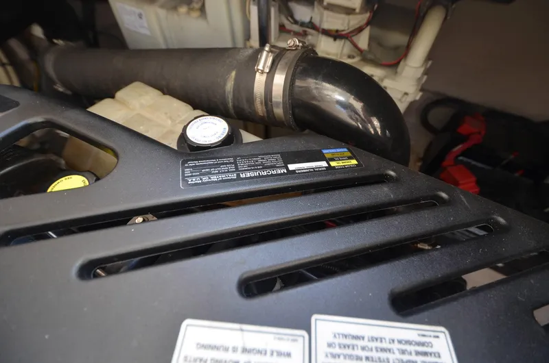 Ma Folie III Yacht Photos Pics Engine compartment of a 2007 Sea Ray 40 Sundancer boat, featuring a MerCruiser component.