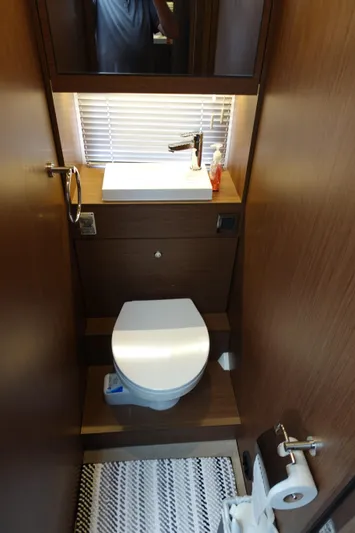 Somedays Here Yacht Photos Pics Modern bathroom in 2021 Jeanneau NC 37 yacht with sink and toilet.