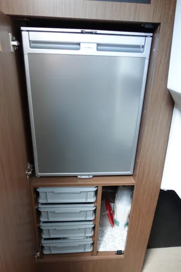 Somedays Here Yacht Photos Pics Cabinet with fridge and storage drawers on 2021 Jeanneau NC 37 boat.