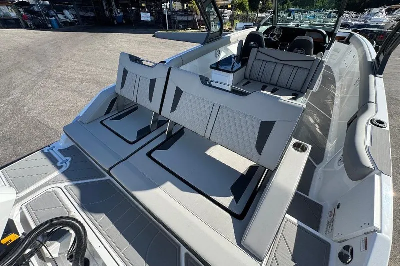  Yacht Photos Pics 2026 Monterey Elite 30 OB boat interior with luxurious seating and modern design.