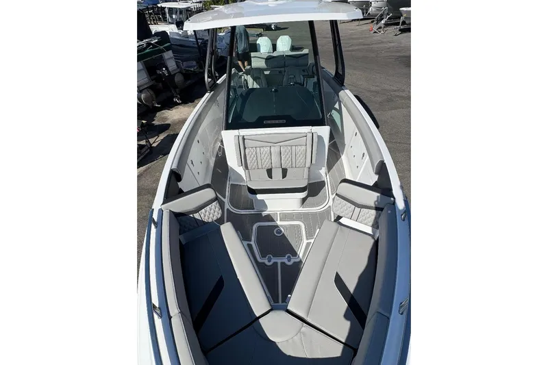  Yacht Photos Pics 2026 Monterey Elite 30 OB boat with spacious seating and modern design.