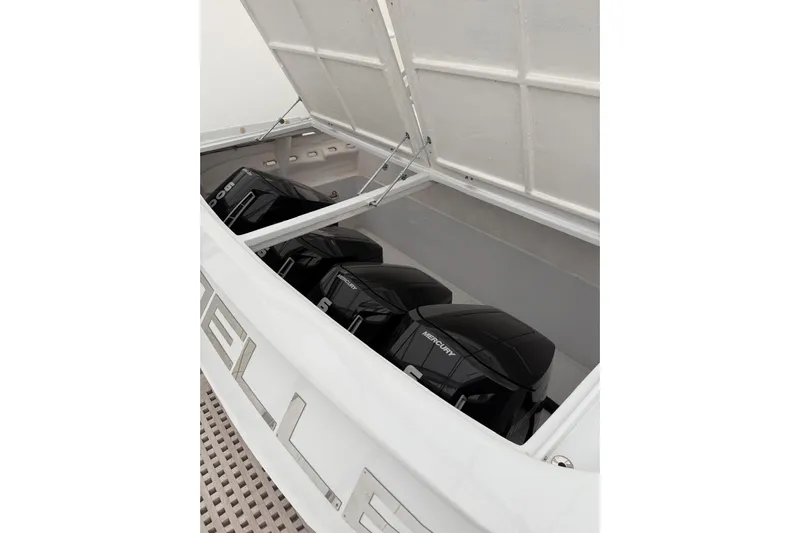  Yacht Photos Pics Open engine compartment of 2023 Zeta Elle 20 with Mercury outboard motors.