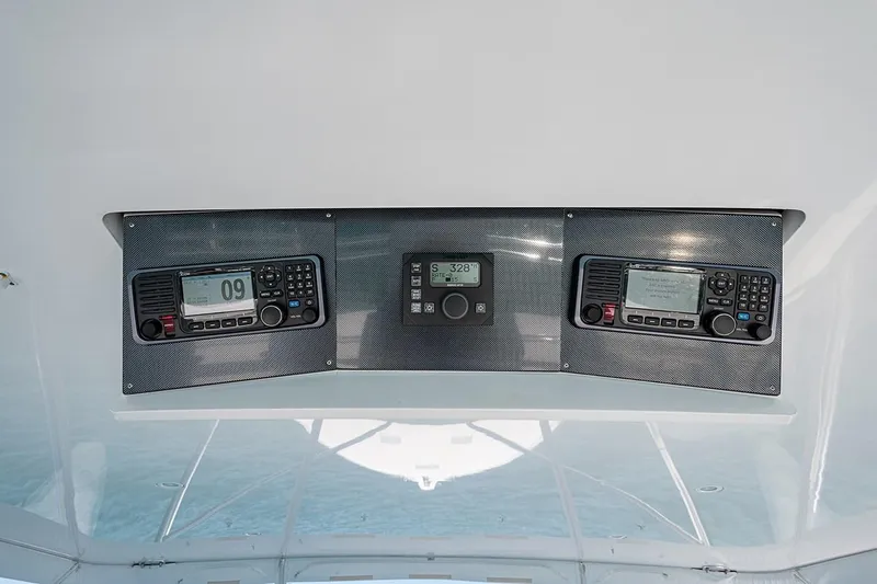 Cast Away Yacht Photos Pics Control panel of 2008 Hatteras 68 Convertible yacht with navigation equipment.