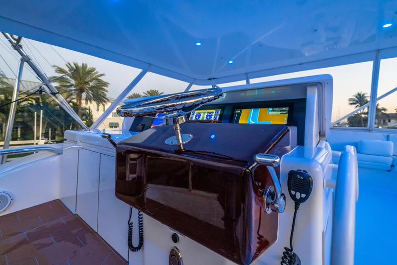 Cast Away Yacht Photos Pics 2008 Hatteras 68 Convertible yacht helm with modern navigation equipment and luxurious design.