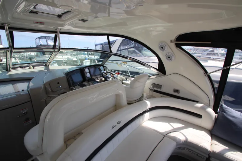  Yacht Photos Pics 2008 Sea Ray 44 Sundancer yacht interior with helm, seating, and navigation equipment.