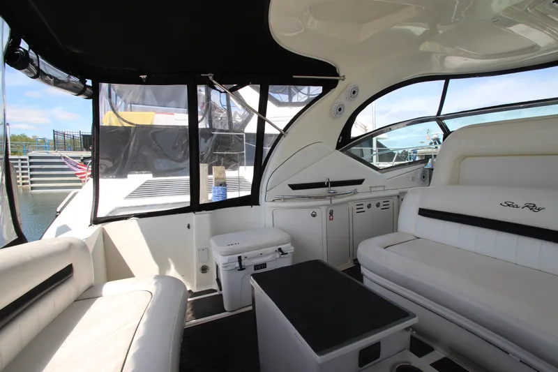  Yacht Photos Pics Interior of 2008 Sea Ray 44 Sundancer yacht with white seating and sleek design.