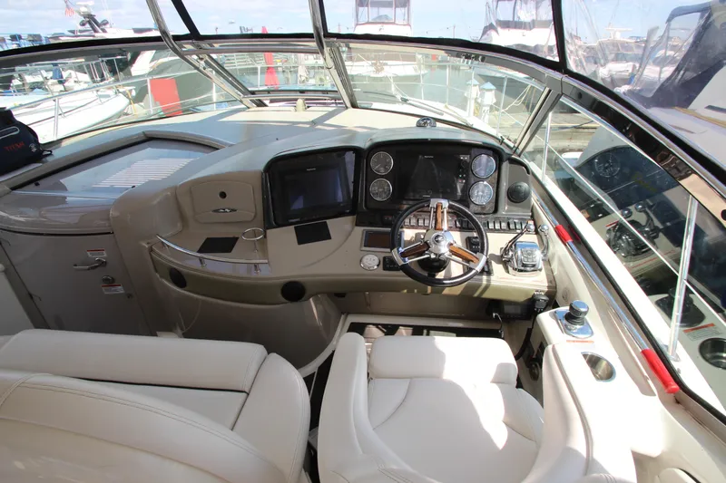  Yacht Photos Pics 2008 Sea Ray 44 Sundancer helm with modern controls and luxurious seating.
