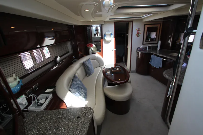  Yacht Photos Pics Luxurious interior of 2008 Sea Ray 44 Sundancer yacht with elegant seating and modern amenities.