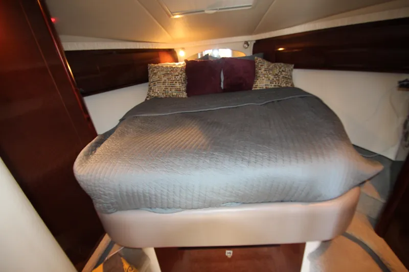  Yacht Photos Pics Luxurious cabin interior of 2008 Sea Ray 44 Sundancer yacht with cozy bedding.