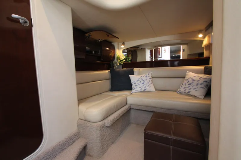  Yacht Photos Pics Luxurious interior of 2008 Sea Ray 44 Sundancer yacht with plush seating and cushions.