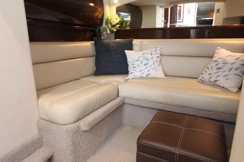  Yacht Photos Pics Luxurious interior of 2008 Sea Ray 44 Sundancer with plush seating and decorative pillows.