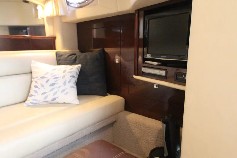  Yacht Photos Pics Interior of 2008 Sea Ray 44 Sundancer with cozy seating and entertainment system.