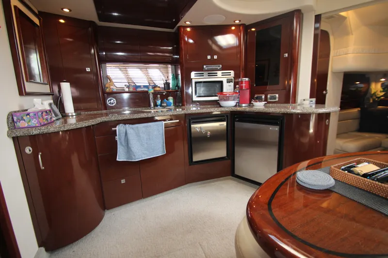  Yacht Photos Pics Luxurious kitchen interior of 2008 Sea Ray 44 Sundancer yacht with modern appliances.