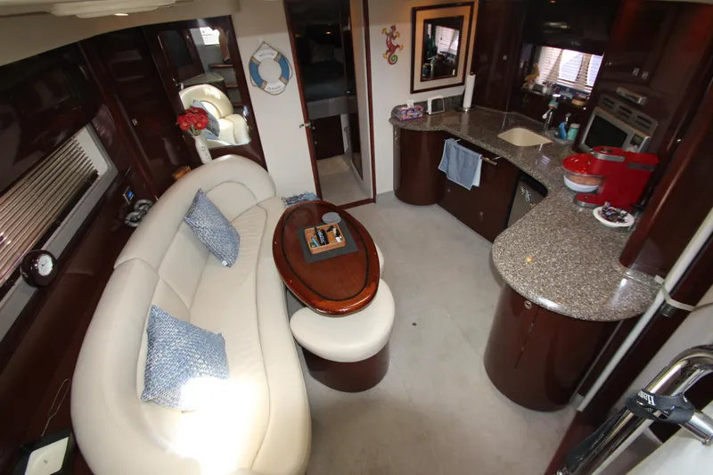  Yacht Photos Pics Luxurious 2008 Sea Ray 44 Sundancer interior with elegant seating and modern kitchen amenities.