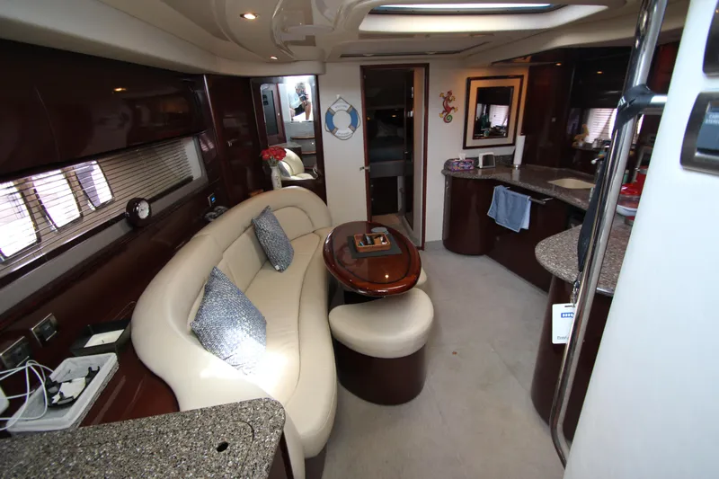  Yacht Photos Pics Luxurious interior of 2008 Sea Ray 44 Sundancer yacht with elegant seating and modern amenities.