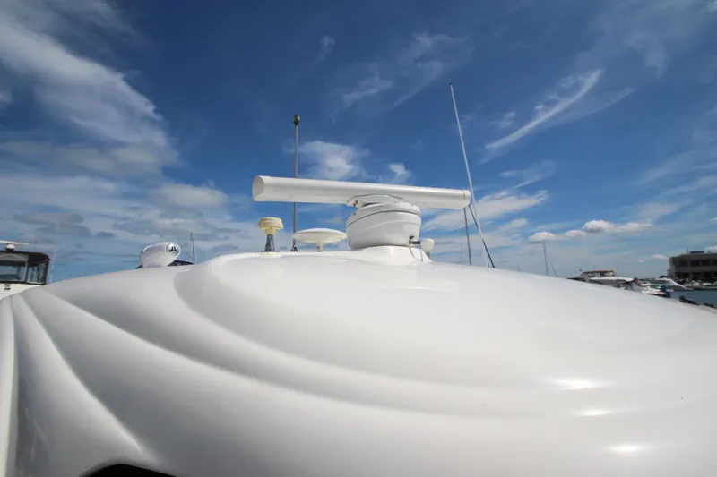  Yacht Photos Pics 2008 Sea Ray 44 Sundancer radar equipment under a clear blue sky.