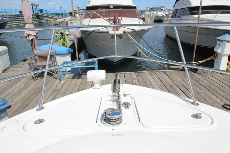  Yacht Photos Pics Bow view of 2008 Sea Ray 44 Sundancer docked at marina.
