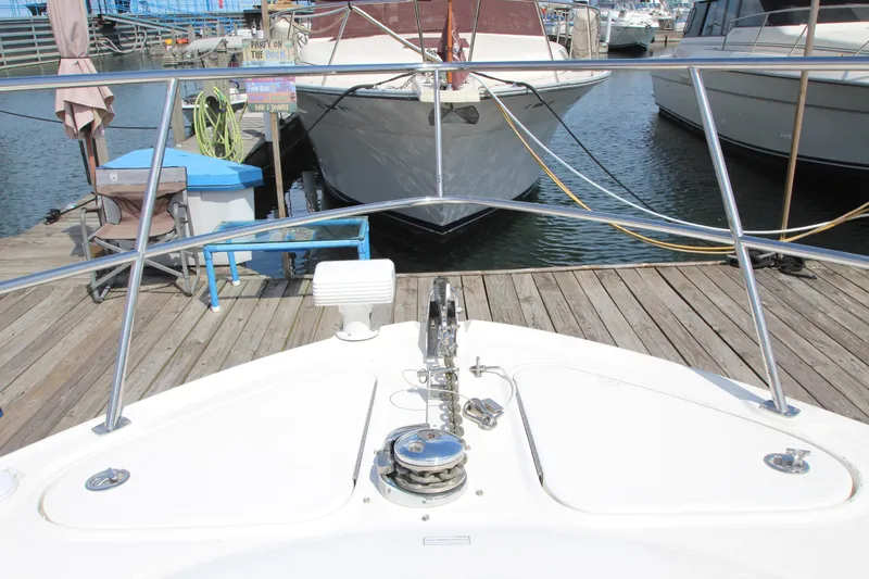  Yacht Photos Pics Bow view of 2008 Sea Ray 44 Sundancer docked at marina.