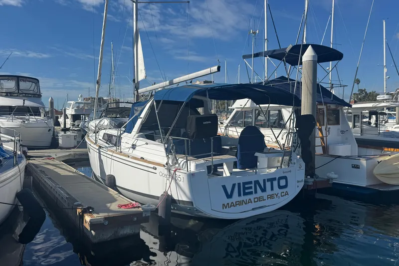 Viento Yacht Photos Pics 2018 Beneteau Oceanis 35.1 sailboat docked at Marina del Rey, sunny day.