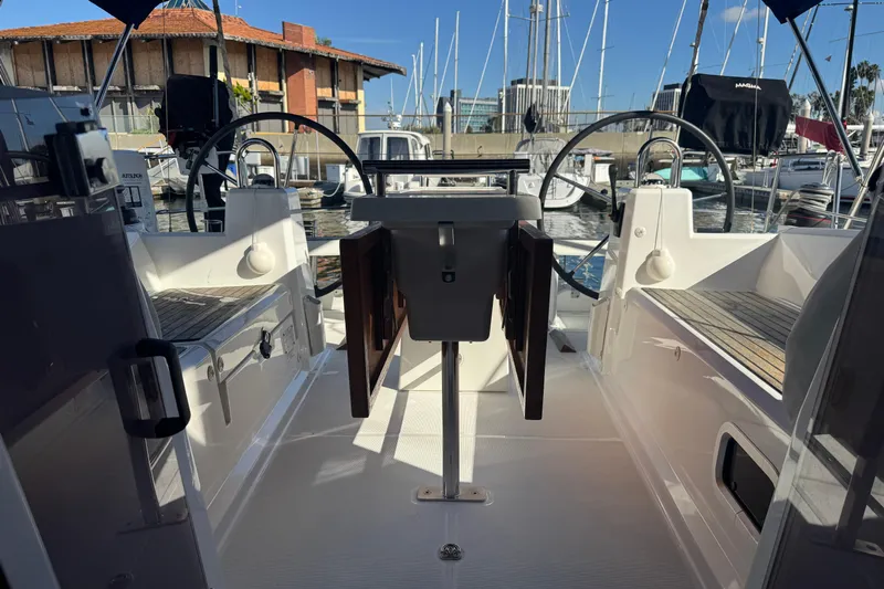 Viento Yacht Photos Pics Cockpit view of 2018 Beneteau Oceanis 35.1 sailboat docked at marina.