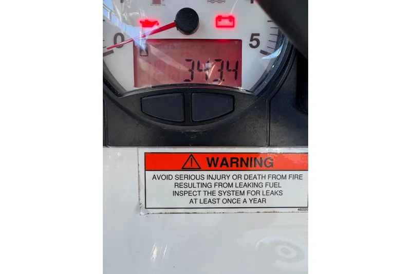 Viento Yacht Photos Pics Warning label on Beneteau Oceanis 35.1 dashboard, 2018 model, highlighting fuel leak inspection.